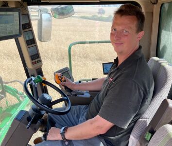 Stuart on the combine harvester