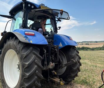 Sophia Farrington on the tractor at the family farm