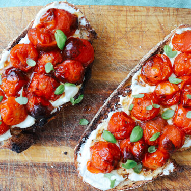 Blackberry Vinaigrette roasted tomatoes with whipped feta on sourdough