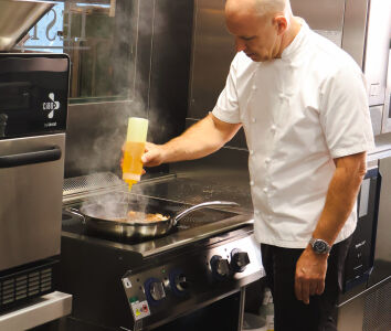 Chef Adam Gray cooking with Mellow yellow
