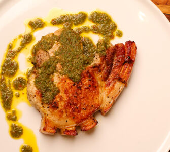 Roasted Ethical Butcher Pork Chops, Celeriac and Apple Slaw, Chimichurri Sauce